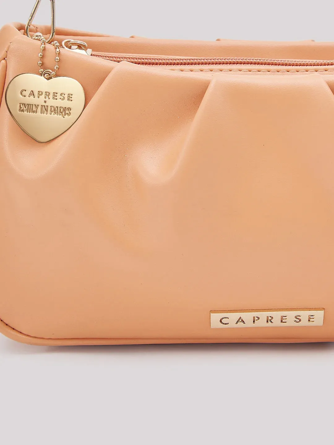 Caprese Emily In Paris Solid Medium Sling Handbag Peach